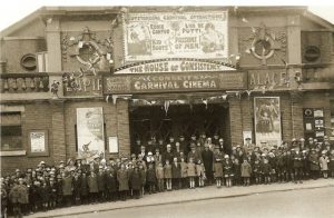 consett-empire-theatre-in-the-year-of-1926-showing-a-crowd-of-eager-children-waiting-for-the-cinema-doors-to-open